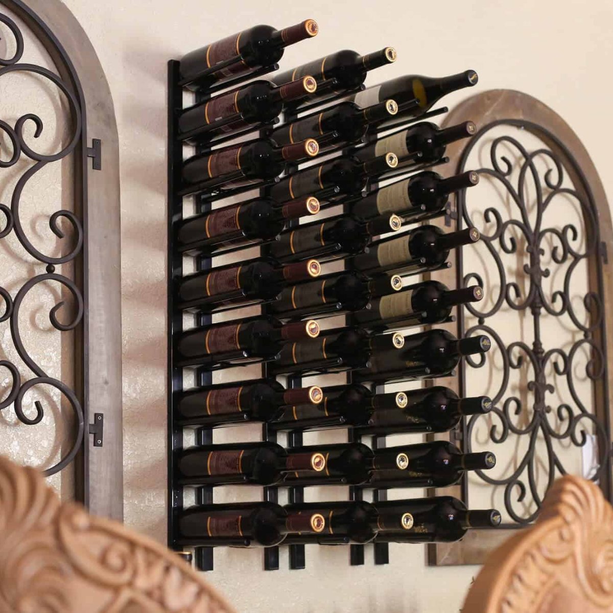 Ultra 4FT Cork-Out Straight Wall Rail Wine Rack (12 Bottles) - Wall-mounted wine rack holding bottles beside decorative wrought iron panels