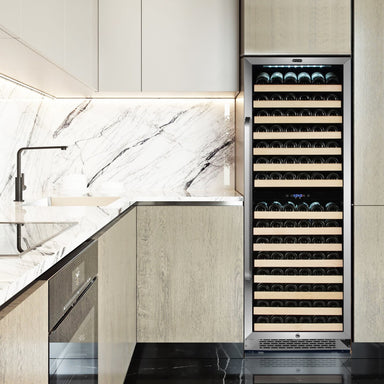 Whynter BWR-1642DZ 164-Bottle Dual-Zone Built-In Wine Refrigerator - Built-in stainless steel wine cooler with wooden shelves in a modern marble-accented kitchen