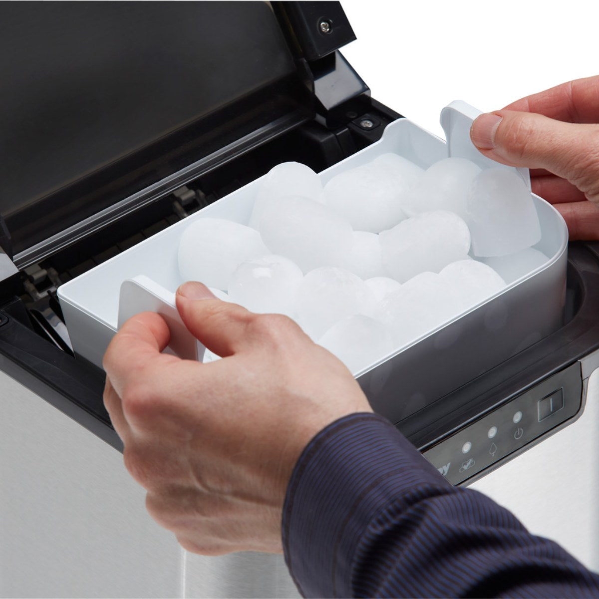 Danby 25 lbs. Countertop Ice Maker in Stainless Steel - Close-up of the ice maker tray filled with ice cubes