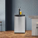 Danby 5.4 cu. ft. Dual Tap Kegerator – Keg Cooler - with a pint of beer on top in a home bar with blue brick walls and wooden flooring