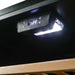 Danby 94 Bottle Freestanding Wine Cooler in Black - close up view of the thermoastat display and LED light
