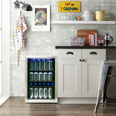Danby 95-Can Freestanding Beverage Center in Stainless Steel - beverage cooler with blue LED lighting in a modern white kitchen