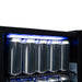 Danby 95-Can Freestanding Beverage Center in Stainless Steel - close up view of the blue light LED and can beverages