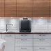 Luma 16 Bottle Shadow Series Freestanding Wine Fridge – 16.9" Black - fridge on countertop in modern white kitchen