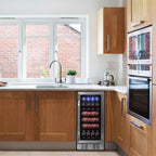 NewAir 96-Can Built-In Beverage Fridge – 15″ Stainless Steel - beverage fridge installed under the counter in a bright wood-cabinet kitchen