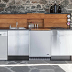 Newair 160-Can Outdoor Beverage Fridge – 24″ Built-In/Freestanding - beverage fridge built into an outdoor kitchen with stone walls and wood accents