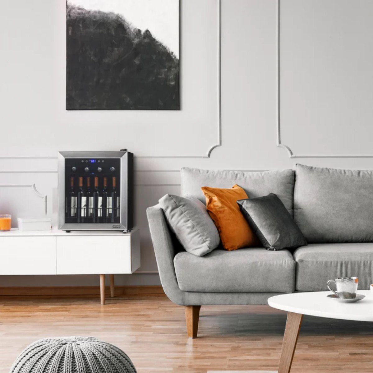 Newair 16 Bottle Freestanding Wine Fridge – 16.9" Stainless Steel - Fridge shown in the living room beside the couch