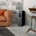Newair 18 Bottle Shadow-T Series Wine Fridge – 10.75" Black - Fridge shown in the living area beside the couch