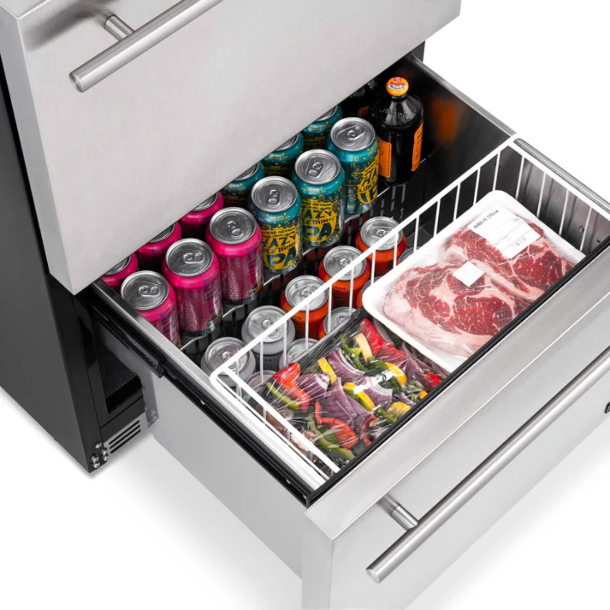 Newair 24″ 80-Can / 20-Bottle Dual Drawer Beverage Fridge - top view of the bottom drawer loaded with cans and meats