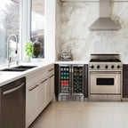 Newair 24” Dual Zone Wine and Beverage Fridge in Stainless Steel - installed under a marble countertop