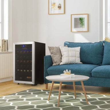 Newair 33 Bottle Freestanding Wine Fridge – 18.9" Stainless Steel - Fridge shown in the living room beside the couch