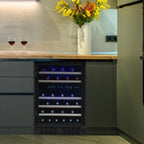 Newair 46 Bottle Dual Zone Wine Cooler – 23.5" Black Stainless Steel - Close up view of the fridge with black stainless steel frame in modern kitchen