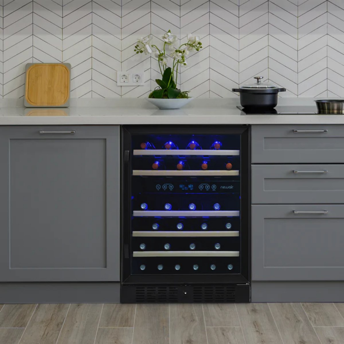 Newair 46 Bottle Dual Zone Wine Cooler – 23.5" Black Stainless Steel - fridge with black stainless steel frame in modern kitchen