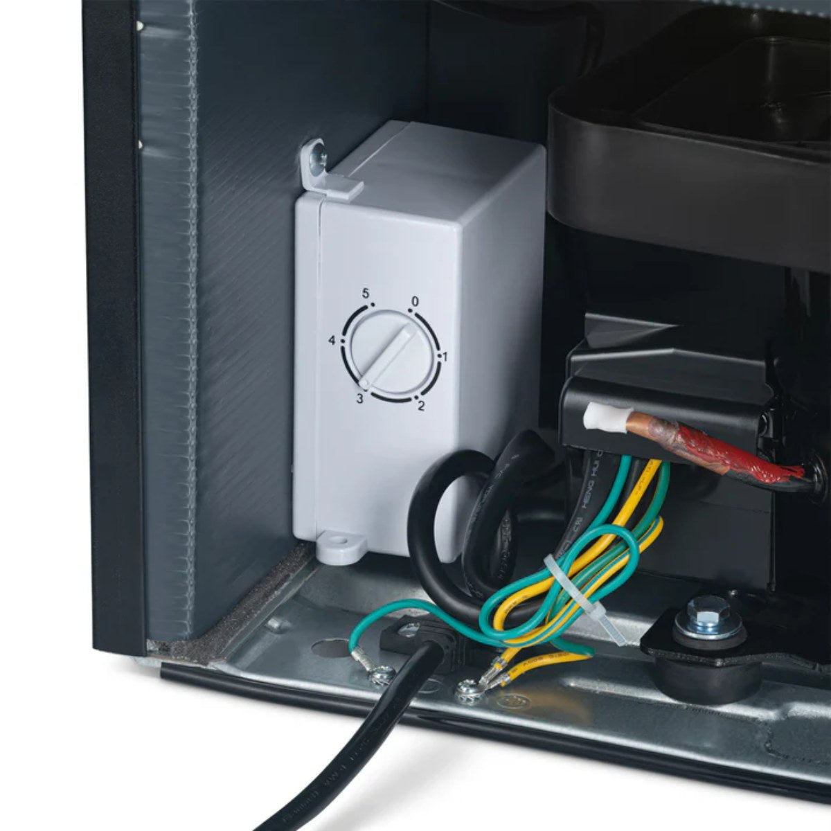 Newair 60-Can Freestanding Beverage Fridge – 16.75" Black - internal mechanical components, showing the adjustable thermostat dial and electrical wiring