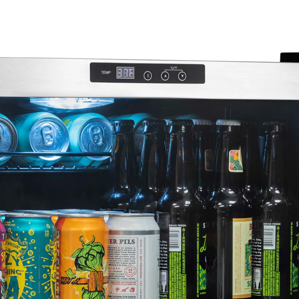 Newair SplitShelf 160-Can Freestanding Stainless Steel Beverage Fridge - Close up view of the thermostat and beverages