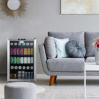 Newair SplitShelf 160-Can Freestanding Stainless Steel Beverage Fridge - Grey living room with a stainless beverage fridge next to the sofa