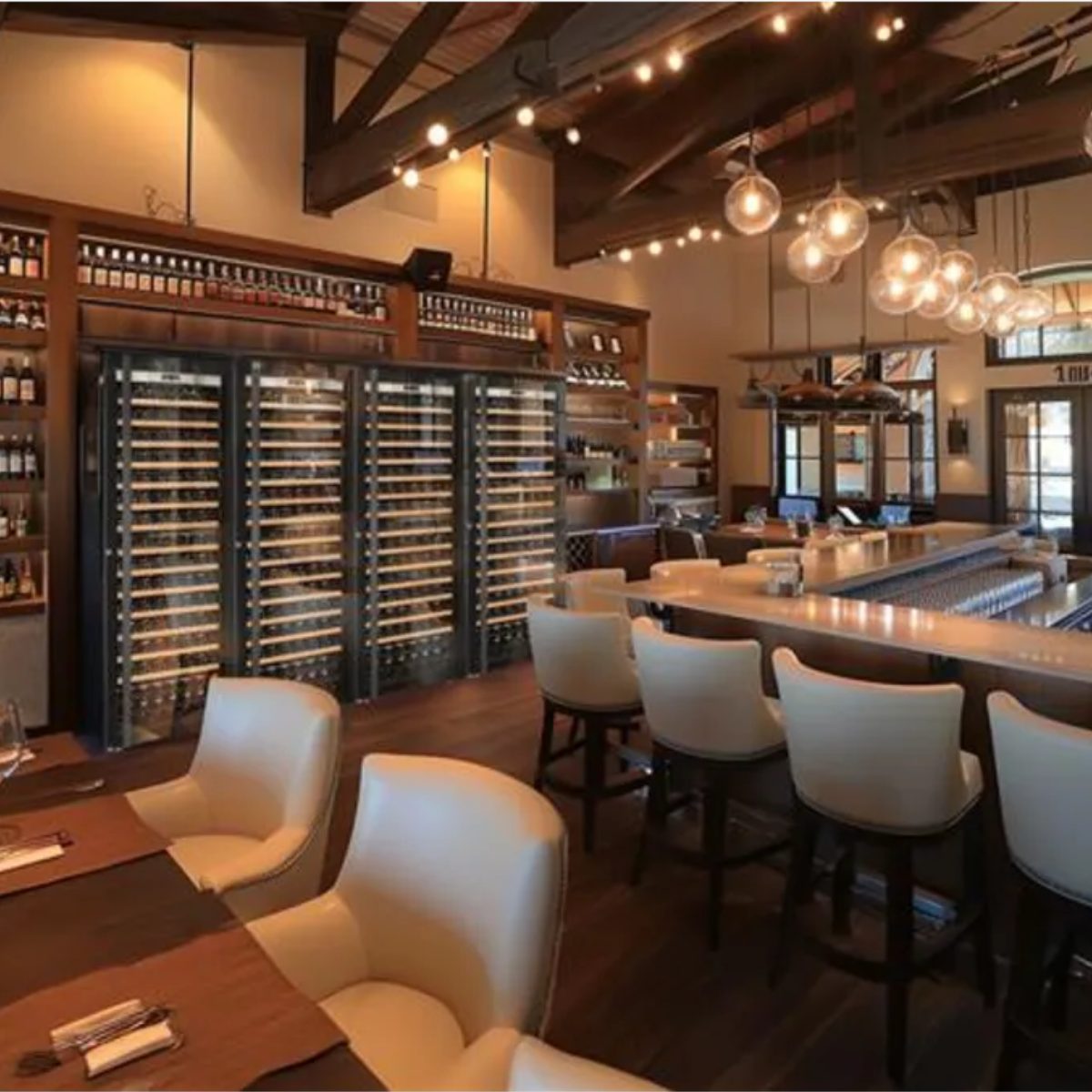 Transtherm by EuroCave Prestige 27" 182 Bottle Single Zone Wine Fridge - fridges installed in a luxury restaurant bar