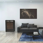 Transtherm by EuroCave Prestige 27" 74 Bottle Single Zone Wine Fridge - displayed in a modern living room beside a gray sofa and abstract wall art