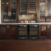 Transtherm by EuroCave Prestige 27" 74 Bottle Single Zone Wine Fridge - integrated into a custom dark wood cabinet bar with glass doors