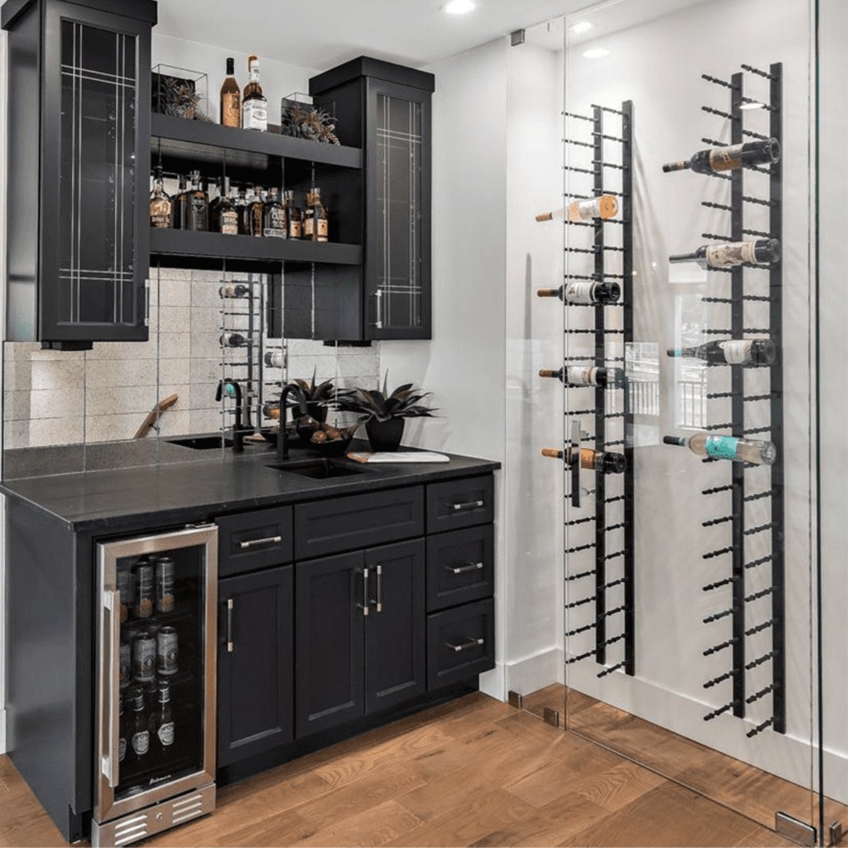 Ultra 1FT Label-Out Horizontal Wall Rail Wine Rack (3–9 Bottles) - Modern home bar with black cabinetry, glass wine fridge, and a glass-enclosed wine rack display