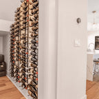 Ultra 4FT Label-Out Horizontal Wall Rail Wine Rack (12–36 Bottles) - Wall-mounted wine rack filled with bottles in a modern home interior