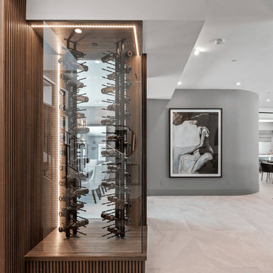 Ultra Floor-to-Ceiling Mounted 2-Sided Wine Rack Display (84 Bottles) - Freestanding glass-enclosed vertical wine display with black metal racking and LED accent lighting