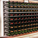 Ultra Fusion 3FT Cork-Out Wine Wall Alumasteel (27 Bottles) - Close-up of wall-mounted wine racks with bottles and LED backlighting