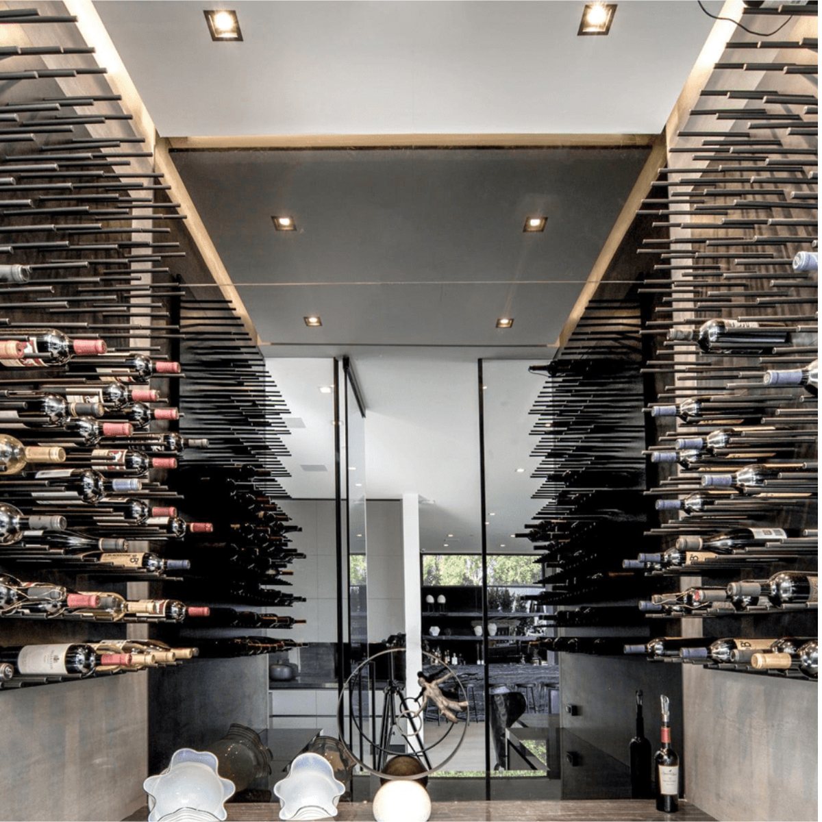 Ultra Fusion 3FT Cork-Out Wine Wall Black Acrylic (27 Bottles) - Modern wine cellar with wall-mounted racks holding bottles horizontally on both sides