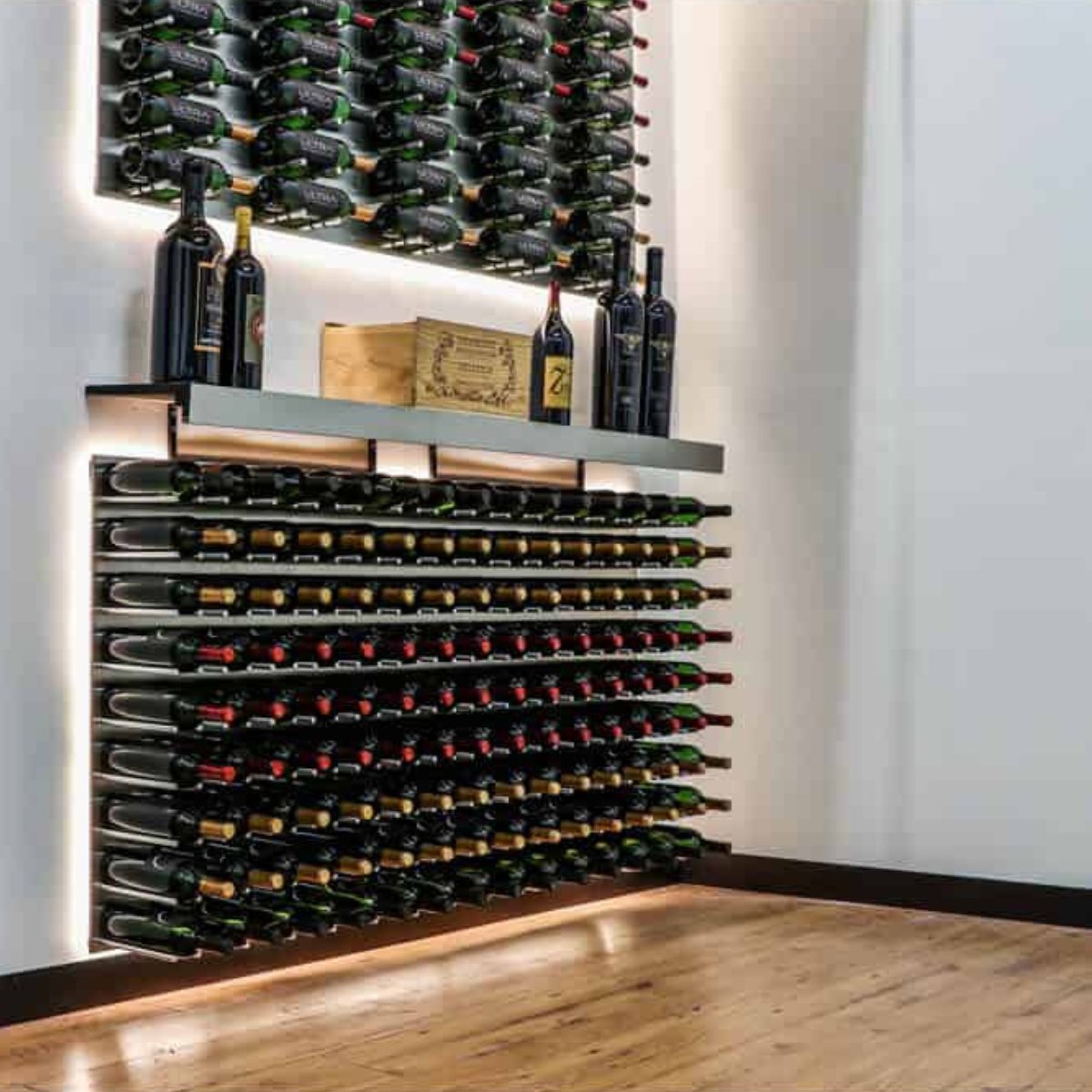 Ultra Fusion 3FT Cork-Out Wine Wall White Acrylic (27 Bottles) - Wall-mounted wine racks with backlit shelving holding rows of wine bottles and display shelf above