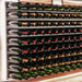 Ultra Fusion 4FT Cork-Out Wine Wall Alumasteel (36 Bottles) - Close-up of wine bottles stored on horizontal wall racks