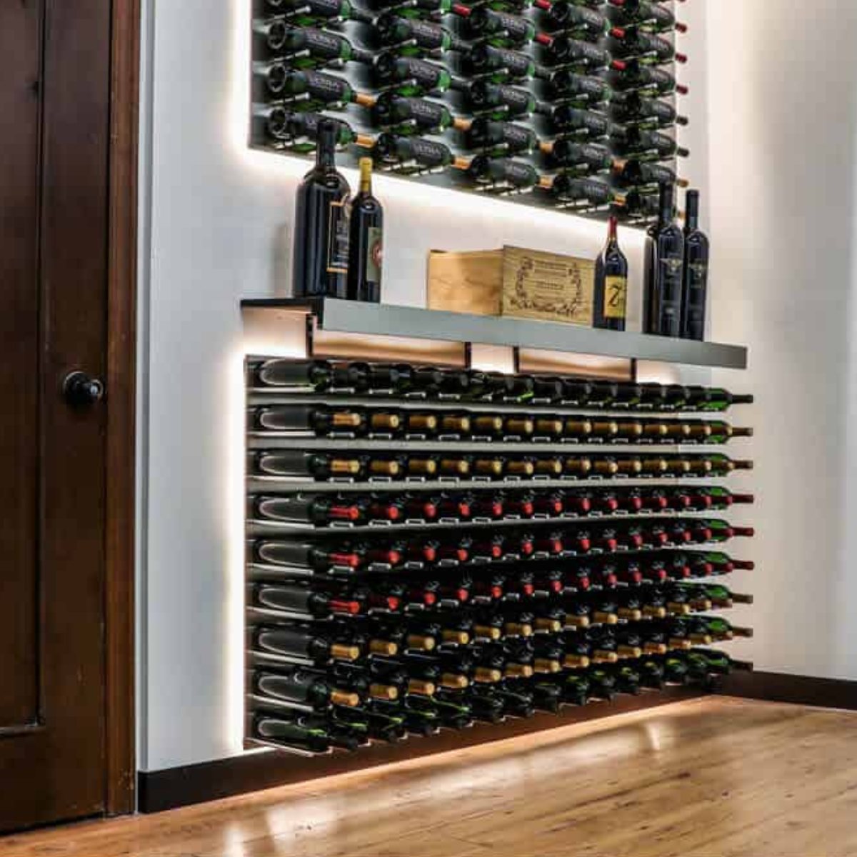 Ultra Fusion 4FT Cork-Out Wine Wall Alumasteel (36 Bottles) - Wall-mounted wine racks with bottles and a display shelf above