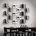 Ultra Fusion Panel Wine Rack – Alumasteel Label-Out - Wall-mounted wine racks in a geometric grid pattern above a modern dining table
