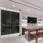 Ultra Fusion Panel Wine Rack – Black Acrylic Cork-Out - Sleek home bar with a glass-enclosed, backlit wine wall and a modern marble counter setup