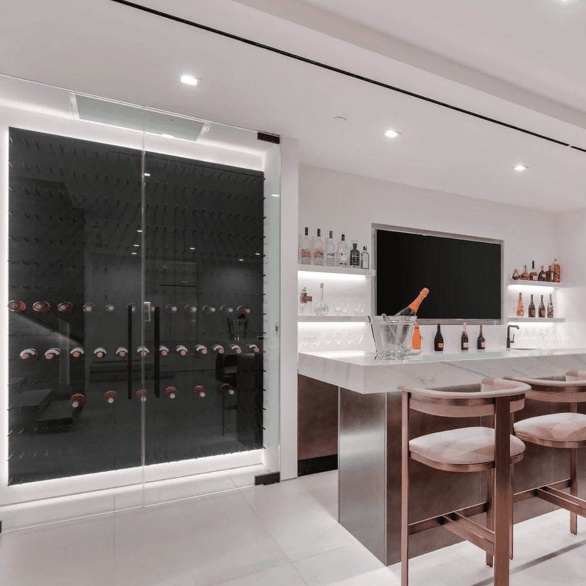 Ultra Fusion Panel Wine Rack – Black Acrylic Cork-Out - Sleek home bar with a glass-enclosed, backlit wine wall and a modern marble counter setup