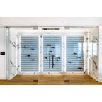Ultra Fusion Panel Wine Rack – White Acrylic Cork-Out - Luxury glass-enclosed wine cellar with marble walls and backlit metal racks