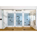 Ultra Fusion Panel Wine Rack – White Acrylic Cork-Out - Luxury glass-enclosed wine cellar with marble walls and backlit metal racks