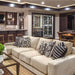 Ultra Label-Out Horizontal Wine Pegs - Modern living room with beige sectional sofa, bar area, and glass-enclosed wine cellar
