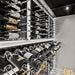 Ultra Label-Out Horizontal Wine Pegs - Modern wine cellar with wall-mounted racks and backlit bottle displays