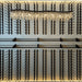 Ultra Showcase Series - Display Row (12 Bottles) - Modern wine rack wall with black metal bottle holders