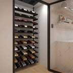 Ultra Showcase Standard Cascade Kits (66 - 99 Bottles) - Modern glass-enclosed wine cellar with black floor-to-ceiling racks holding bottles in a cascading style triple deep