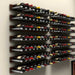 Ultra XL Cork-Out Wine Peg - Wall-mounted wine racks with multiple rows of bottles in a neat, horizontal display