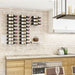 VintageView 1 Foot wall mounted wine rack installed on a stone tile kitchen backsplash with horizontal wine bottle display