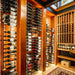 VintageView 4 Foot wall mounted wine storage rack installed in a warm wood wine cellar with label forward bottle display