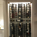 VintageView 4 inch wall mounted metal wine rack installed in a recessed wall niche with label forward wine display