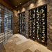 VintageView Feature Wall 6-foot wine rack kit installed inside a stone wine cellar with floor-to-ceiling bottle display