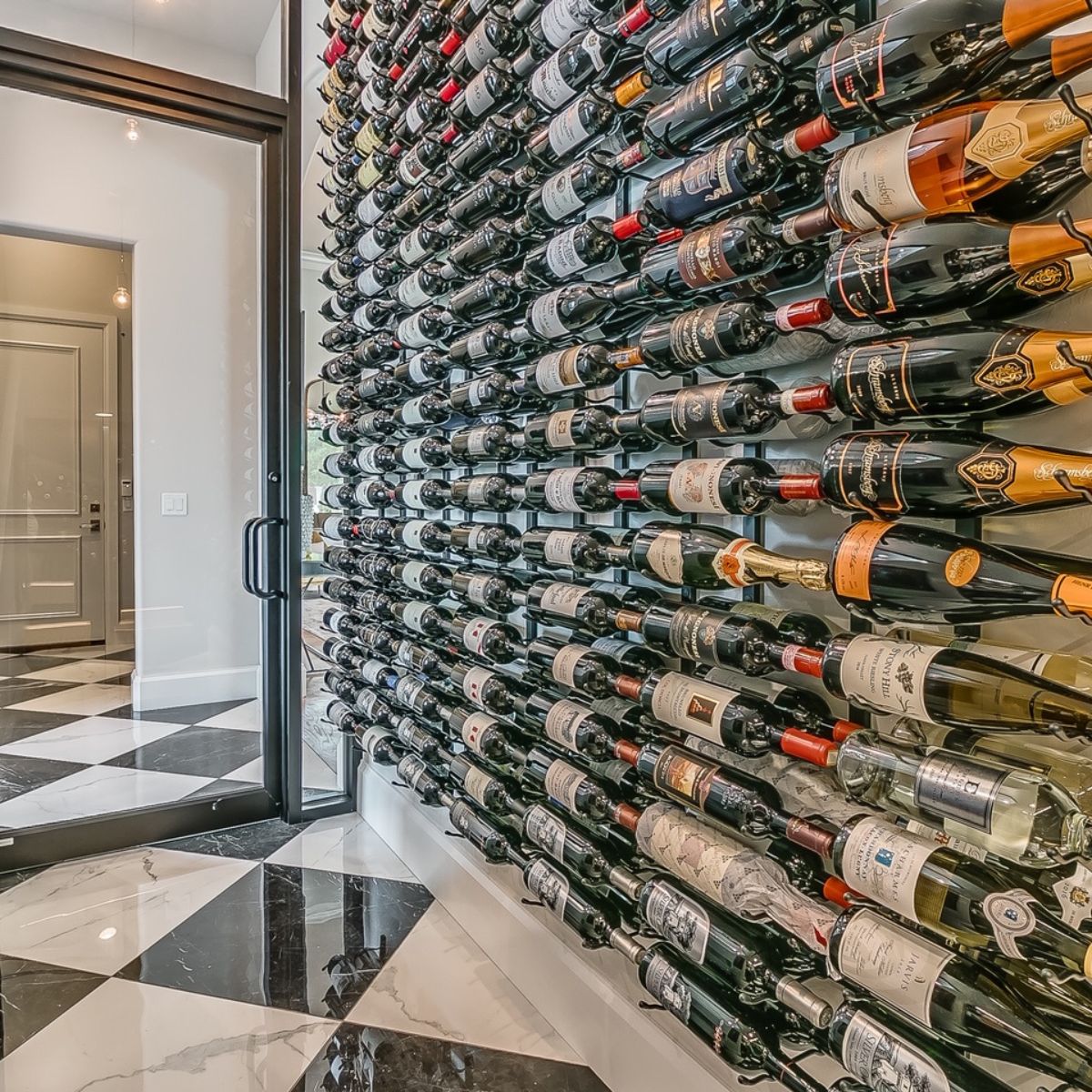 VintageView Feature Wall 7-foot wine rack installed behind glass in a temperature controlled wine cellar