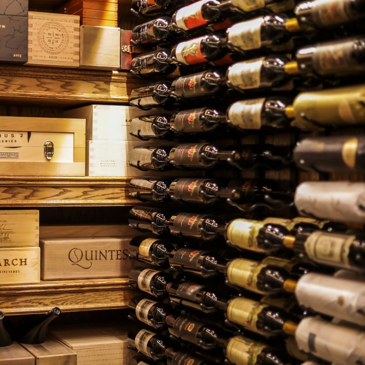 VintageView Feature Wall 7-foot wine rack installed alongside wood cellar shelving with horizontal bottle storage