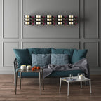 VintageView Over the Couch wall mounted wine rack triple deep 45 bottles installed on a dark accent wall above seating