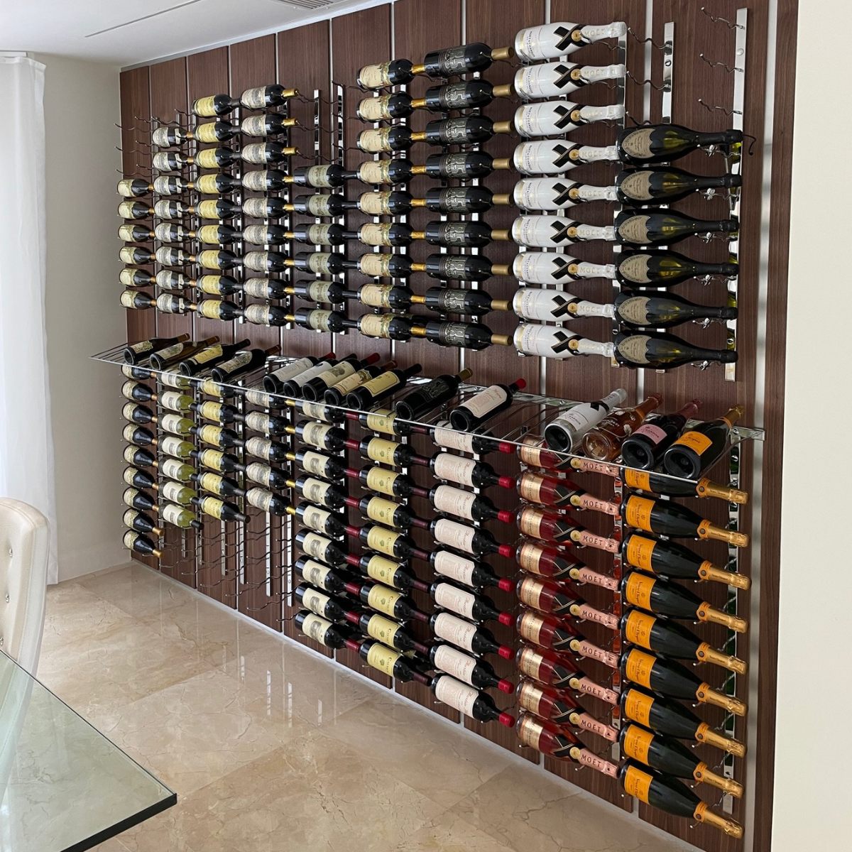VintageView Presentation Row Display wall mounted wine rack installed as a large residential wine wall