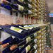 VintageView Presentation Row Display wall mounted wine rack used in a retail wine store display